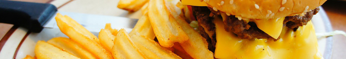 Eating Burger at Latham's Hamburger Inn restaurant in New Albany, MS.